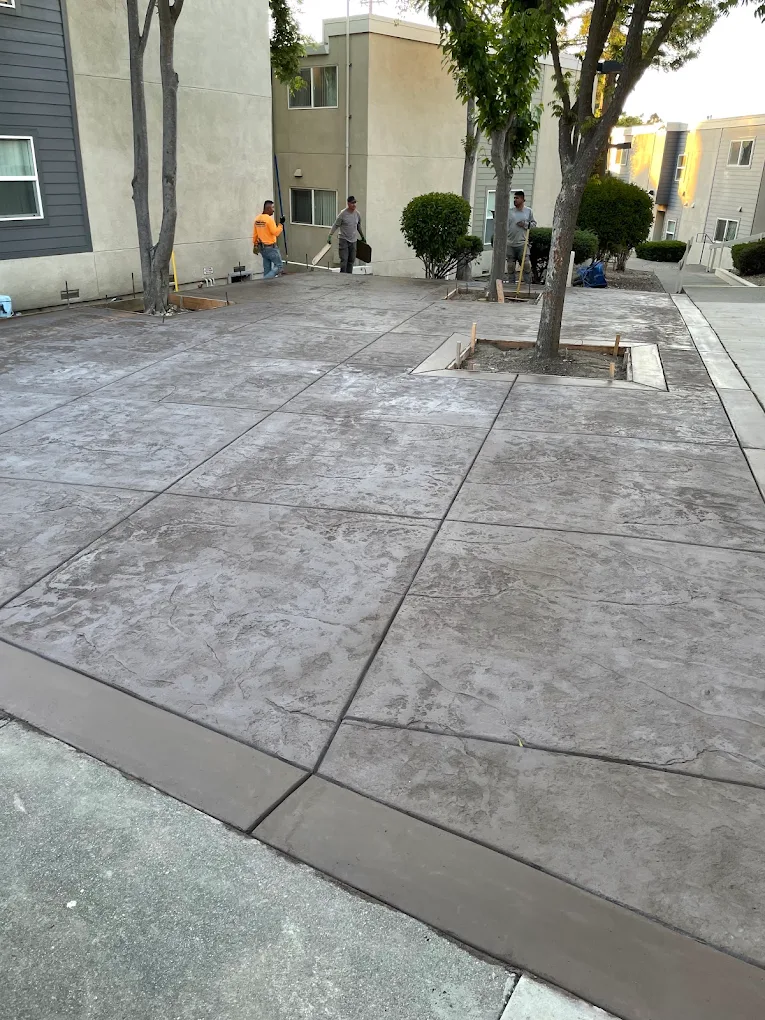 Stamped concrete flatwork with clean score lines